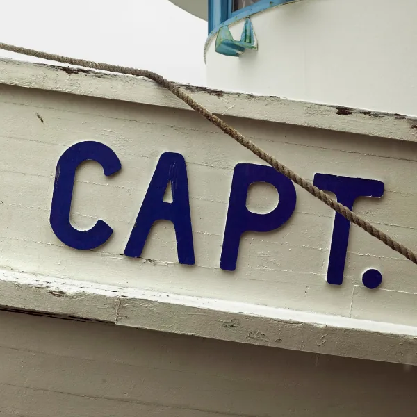 Boat lettering on a white hull