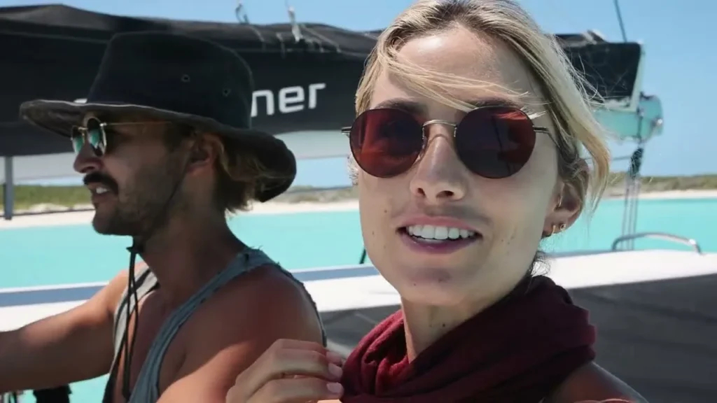 Riley and Elayna of Sailing La Vagabonde aboard their sailboat