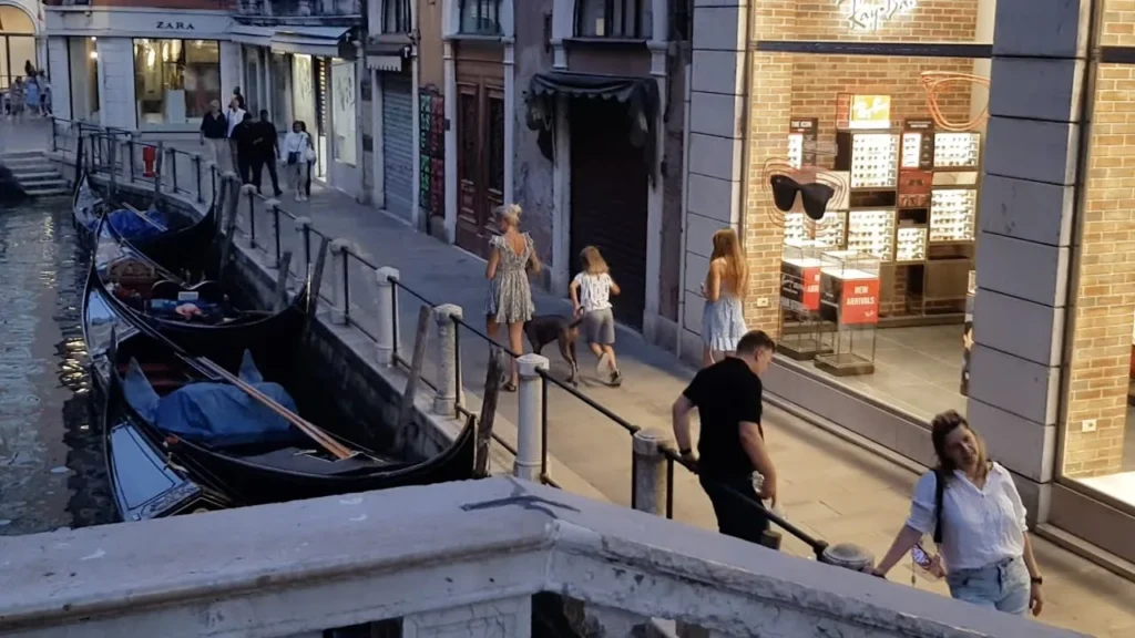Sailing Pickle Family exploring a canal-side destination