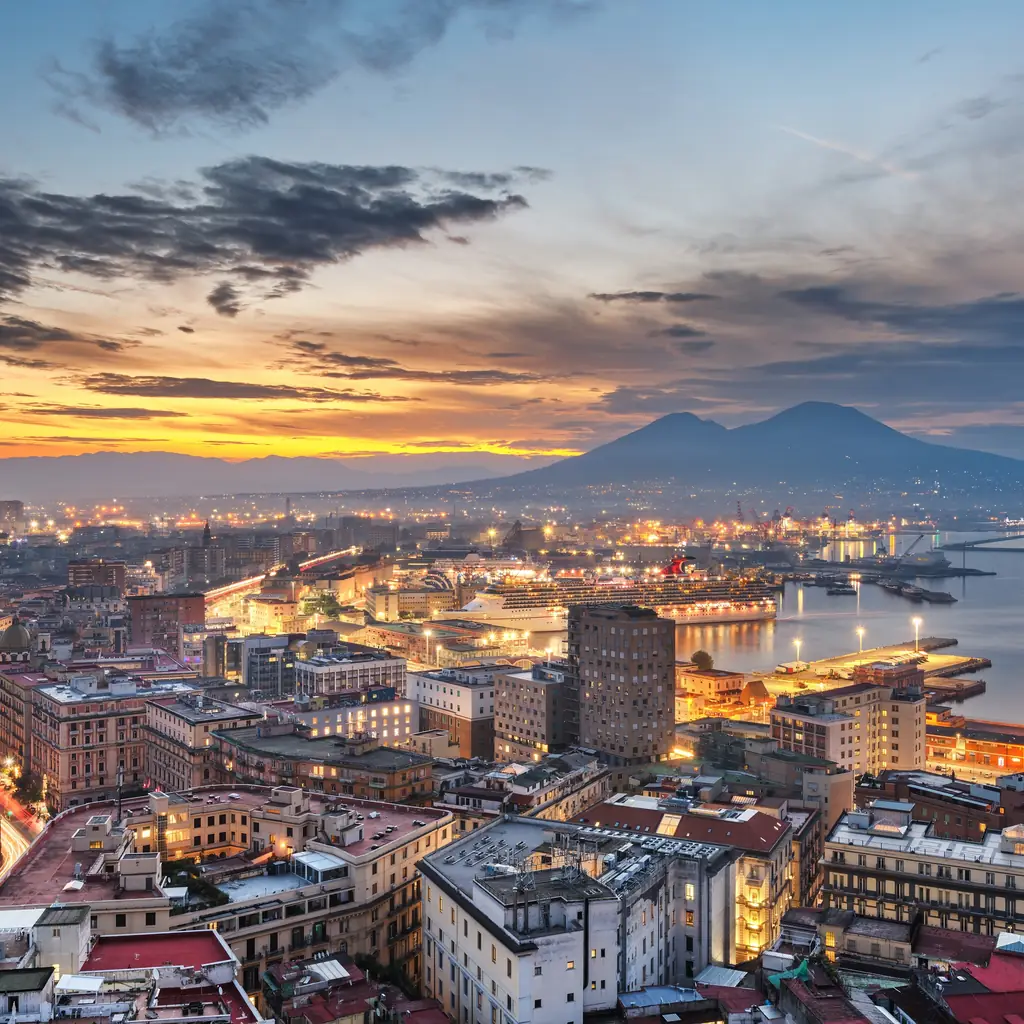 The port and city of Naples, Italy, with Vesuvius in the distance