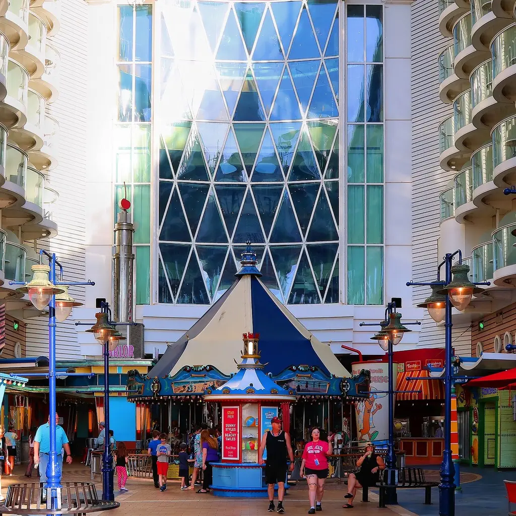Inward-facing balconies above the Boardwalk on an Oasis-class cruise ship