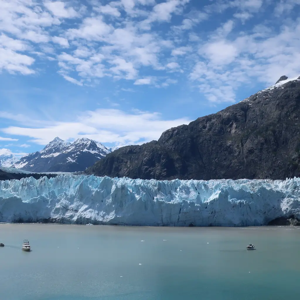 A large glacier seen from a cruise ship balcony in Alaska, illustrating the scenic-positioning upgrades covered in this guide.