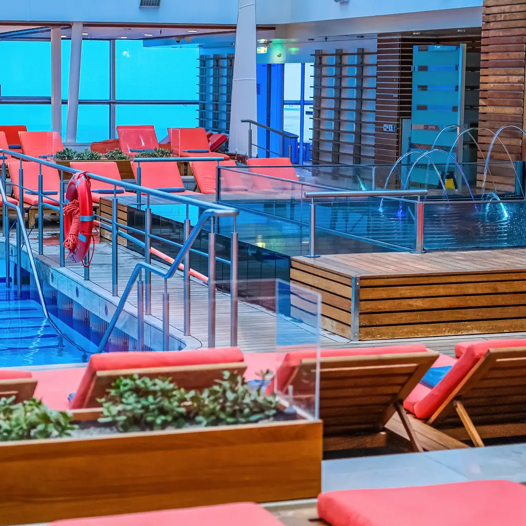 A private pool and sundeck area aboard a cruise ship, the type of suite-enclave space some lines reserve for top cabin categories.