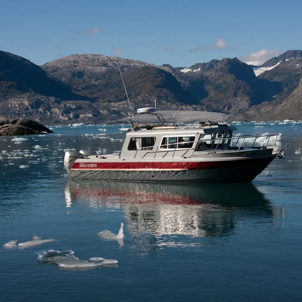A small tour boat near Columbia Glacier in Prince William Sound, Alaska, the kind of small-ship wildlife cruise that departs from Valdez.